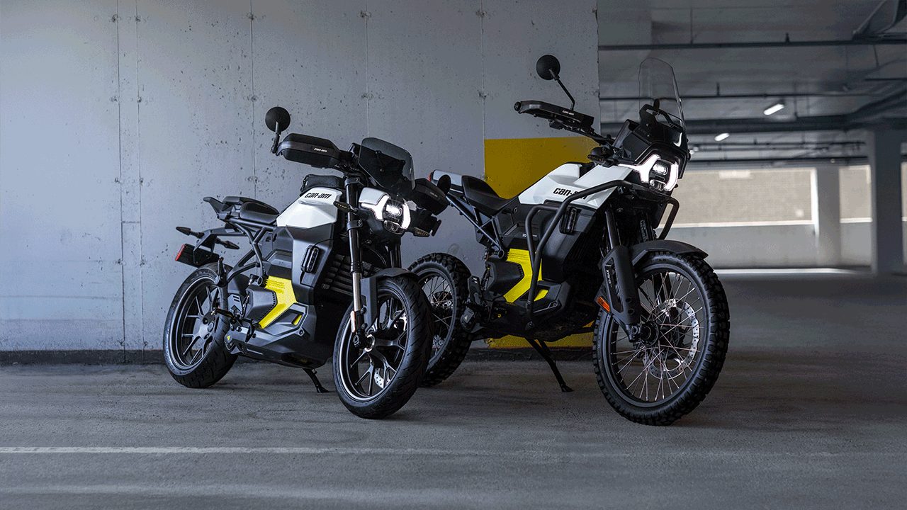 Can-Am Pulse & Origin electric motorcycles parked in a multi-story parking garage
