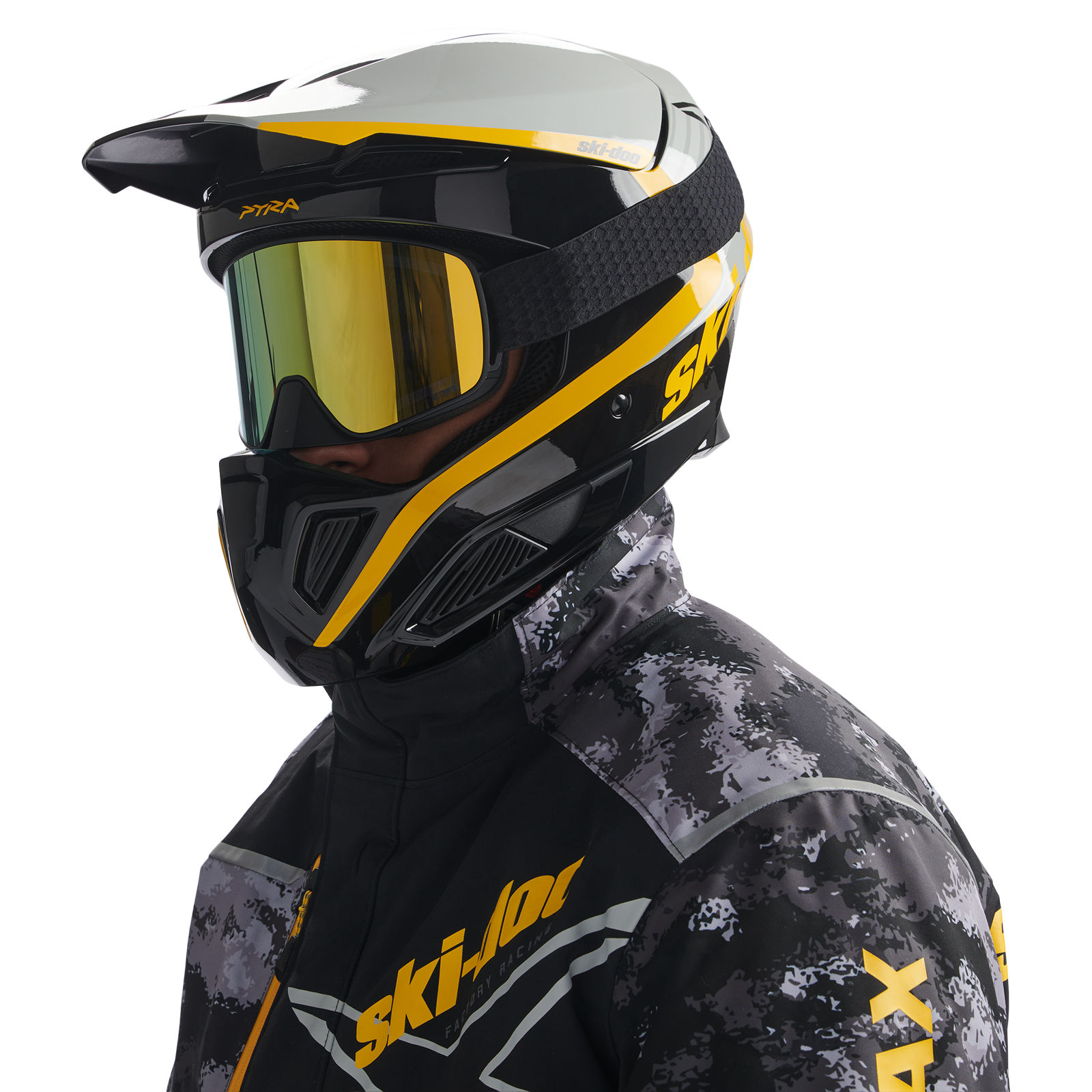 Man wearing a Ski-Doo Pyra X-Team Edition Ultra-Light Helmet (DOT/ECE)