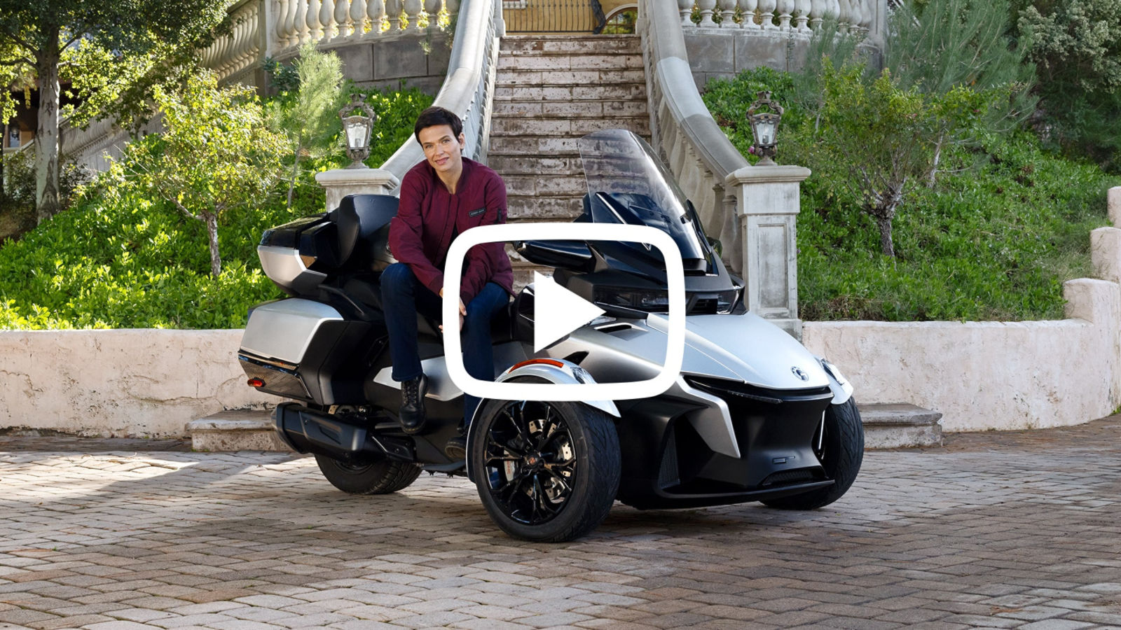 Woman sitting on a Can-Am 3 Wheel Spyder RT
