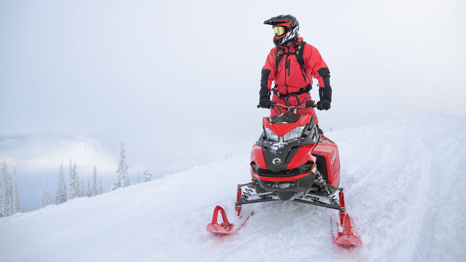 Man on his Lynx snowmobile