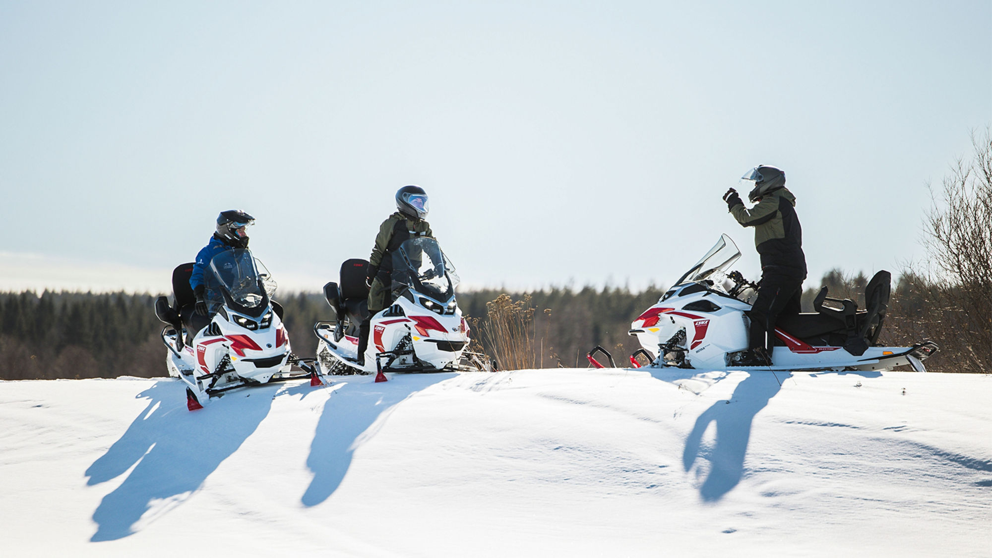 Three riders on their Lynx Adventure Electrics