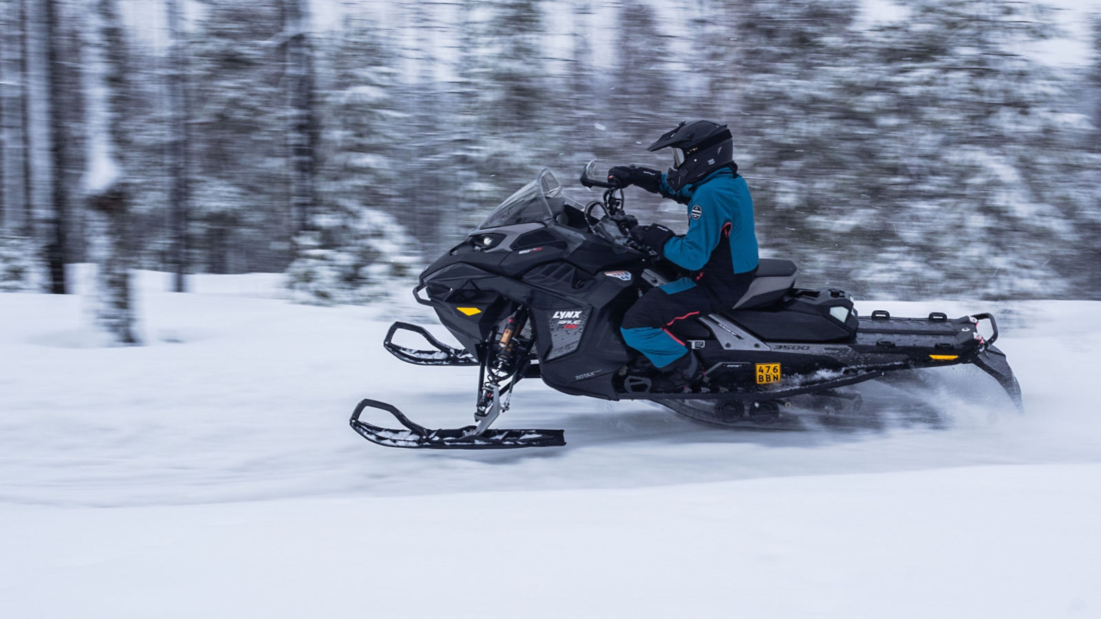 2026 Lynx Rave RE snowmobile riding at high speed