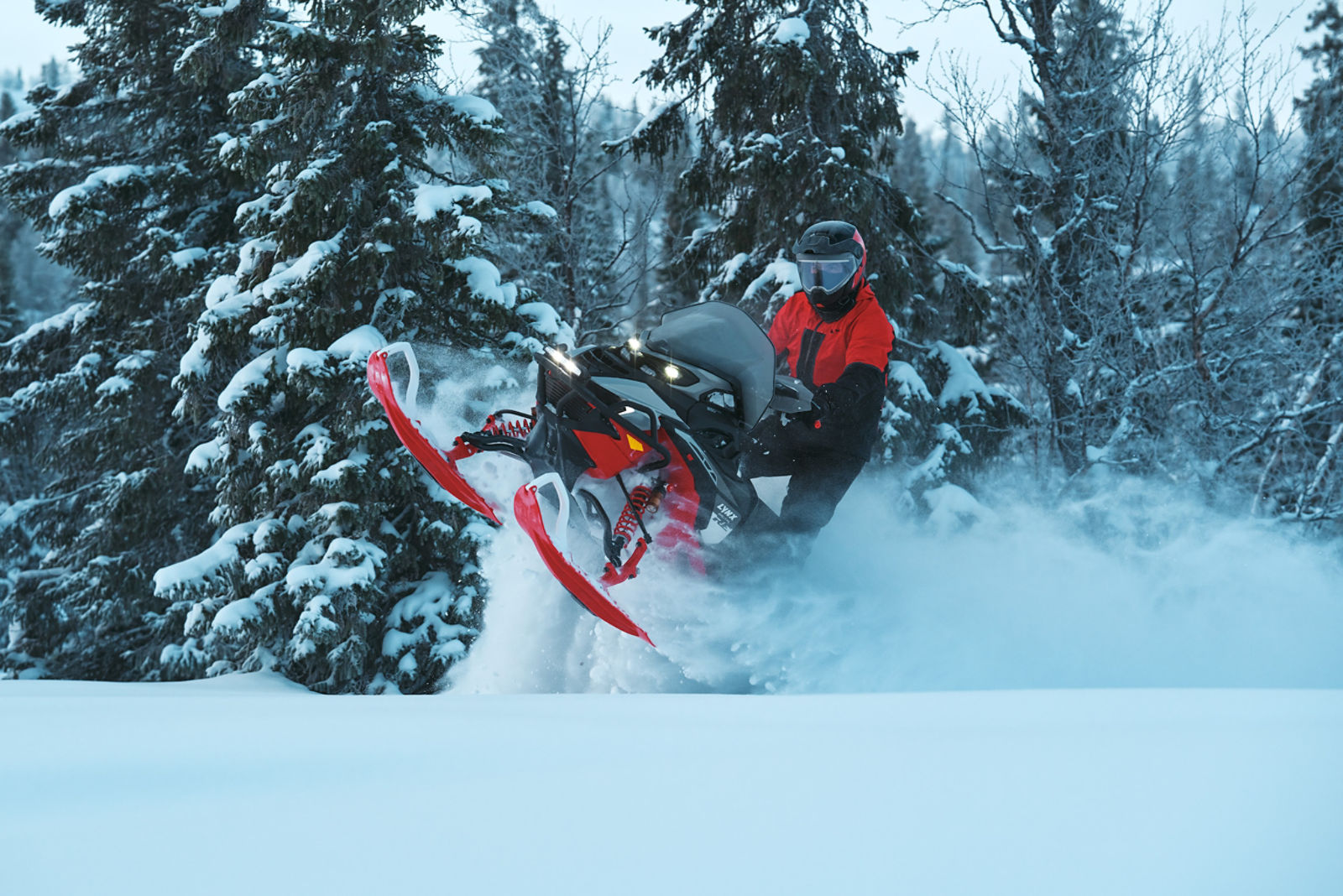 Rider in a mid-air on a 2027 Lynx Brutal RE snowmobile
