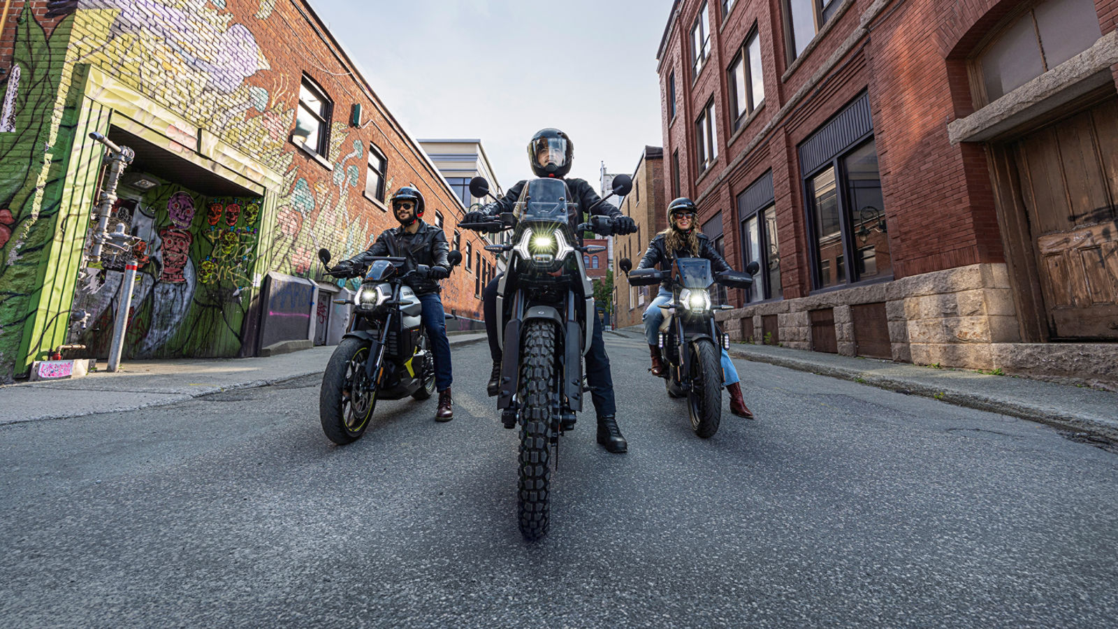 Riders driving on Can-Am motorcycles in the city