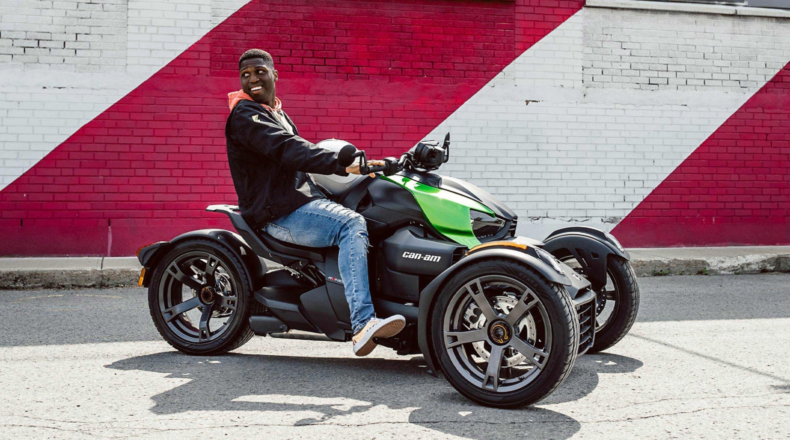 Rider sitting on top of vehicle