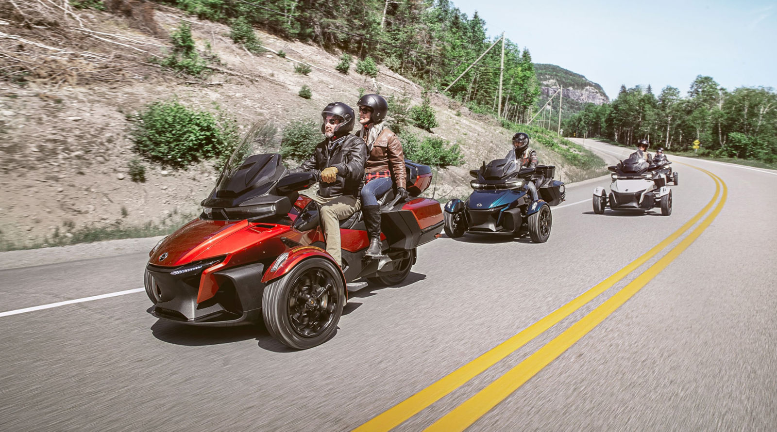 Three vehicles on open road