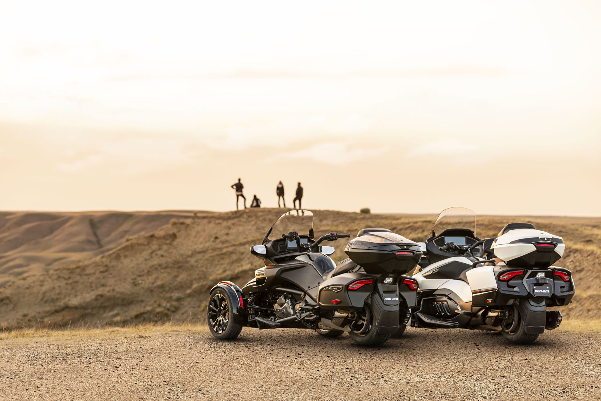 View of two Can-Am Spyder RT side by side with various touring equipment.