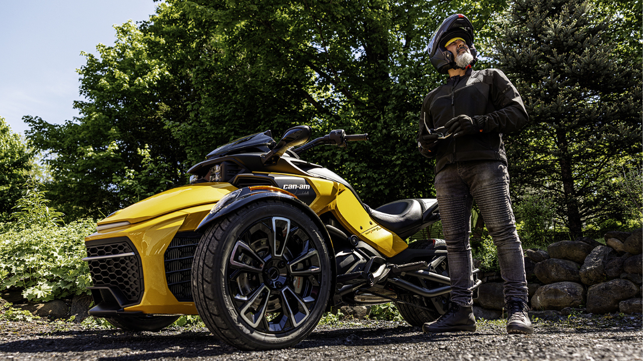 A rider on his 2026 Can-Am Spyder F3 on a paved road