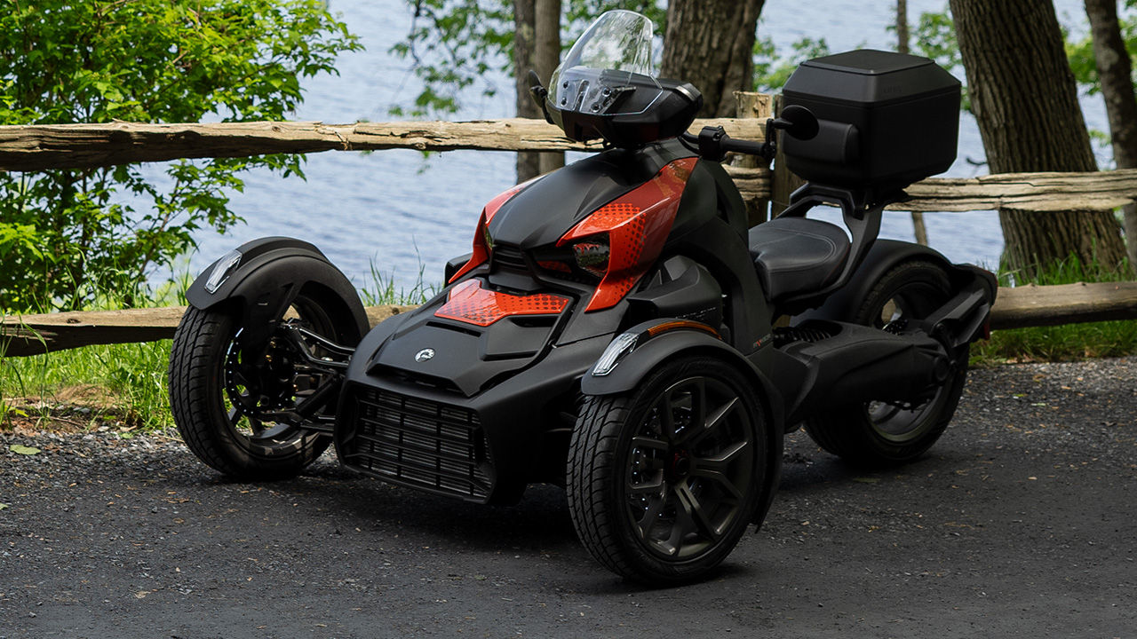 Rider turning on their Can-Am 3-wheel motorcycle
