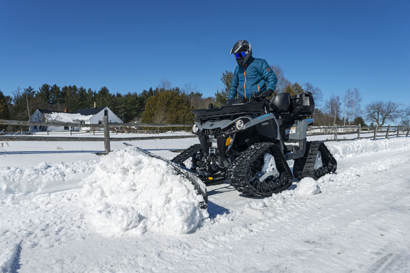 Shoveling show with a Can-Am Outlander ATV