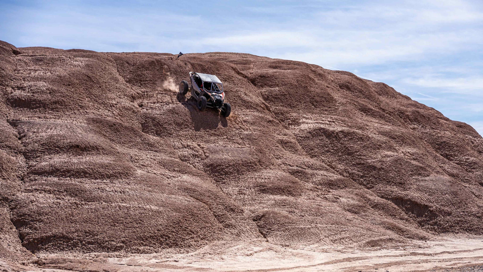 Can-Am Off-Road vehicle on desert hill  