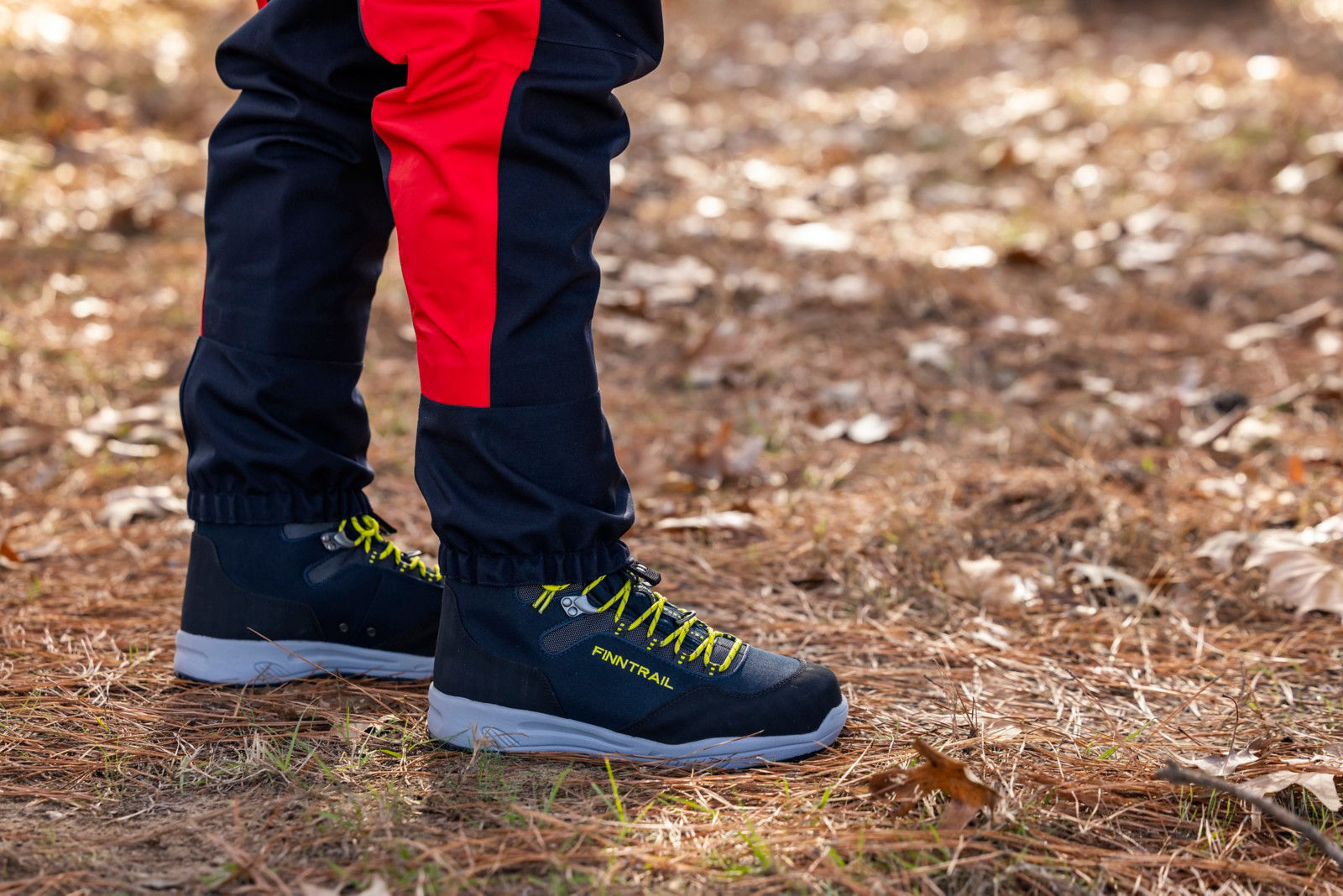 Pair Can-Am x Finntrail Waterproof Boots with waders for exceptional fit, grip, and comfort.