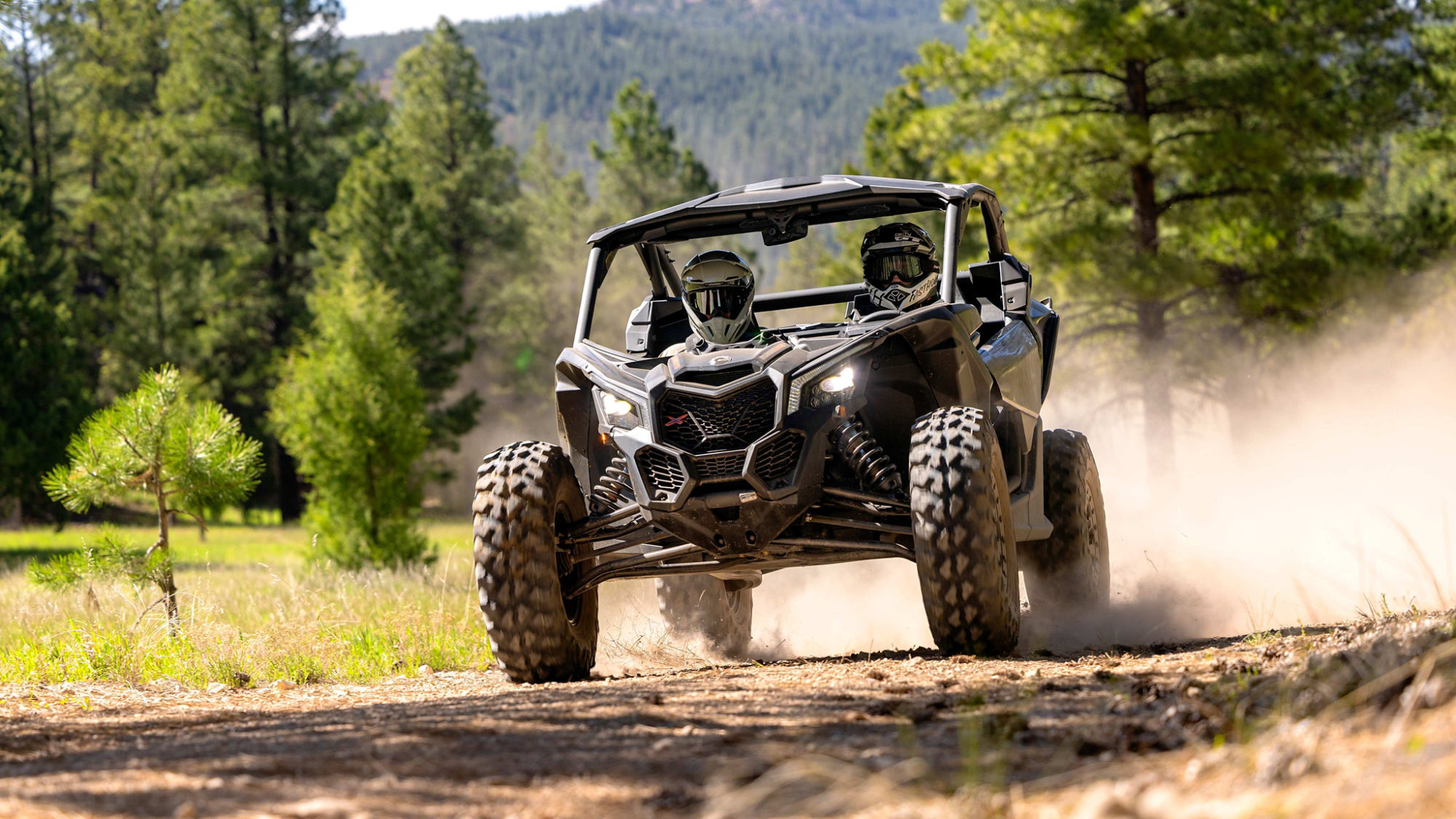 Two drivers on the trail in a Can-Am Maverick X3 DS 2025