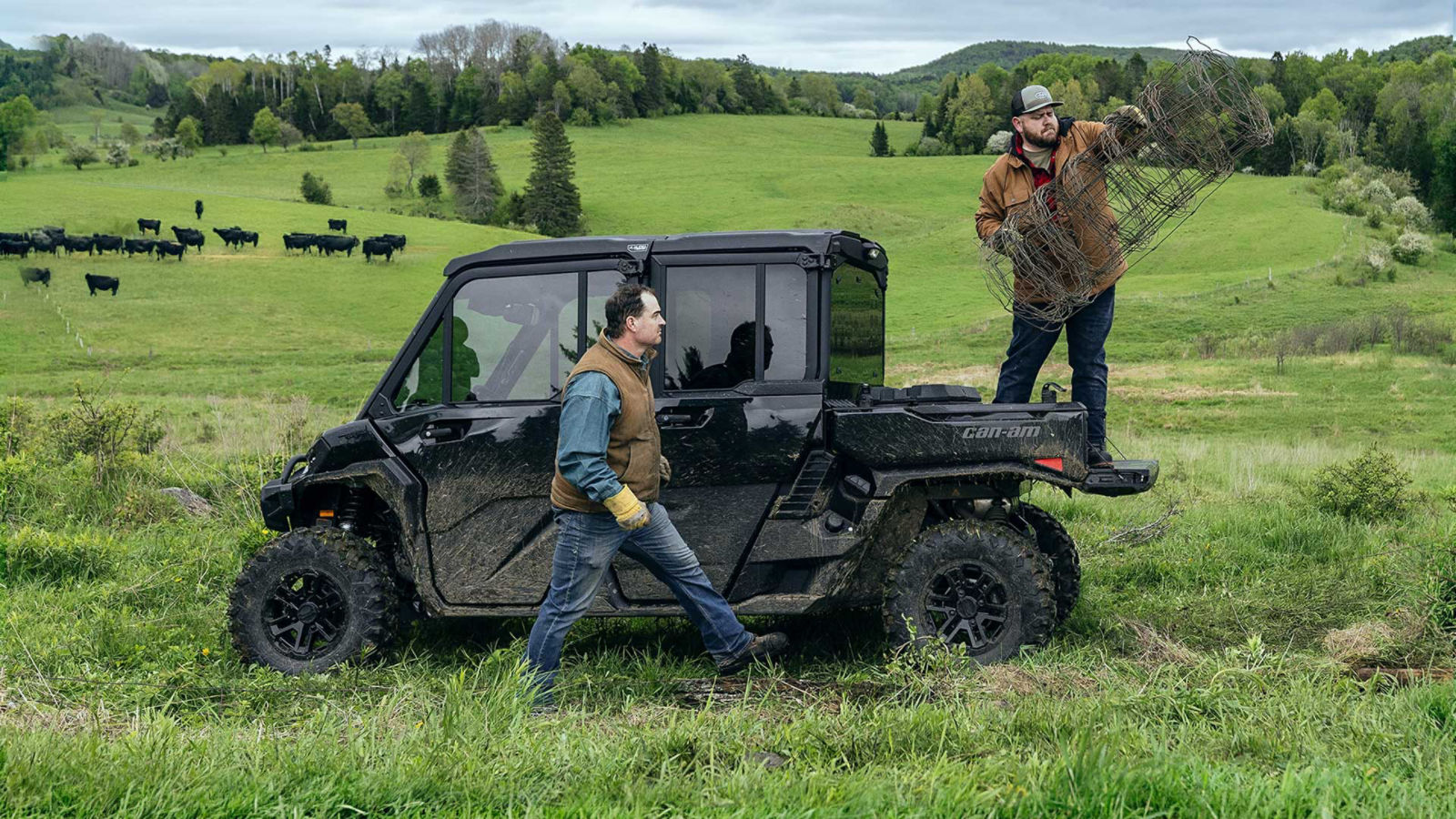 Two farmers working on their land with a Can-Am MAX side-by-side