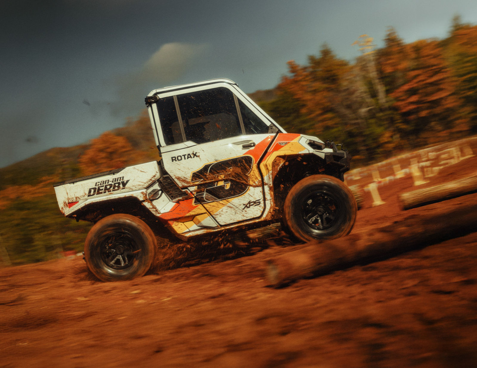 Two Can-Am side-by-side vehicles racing during the Can-Am Derby