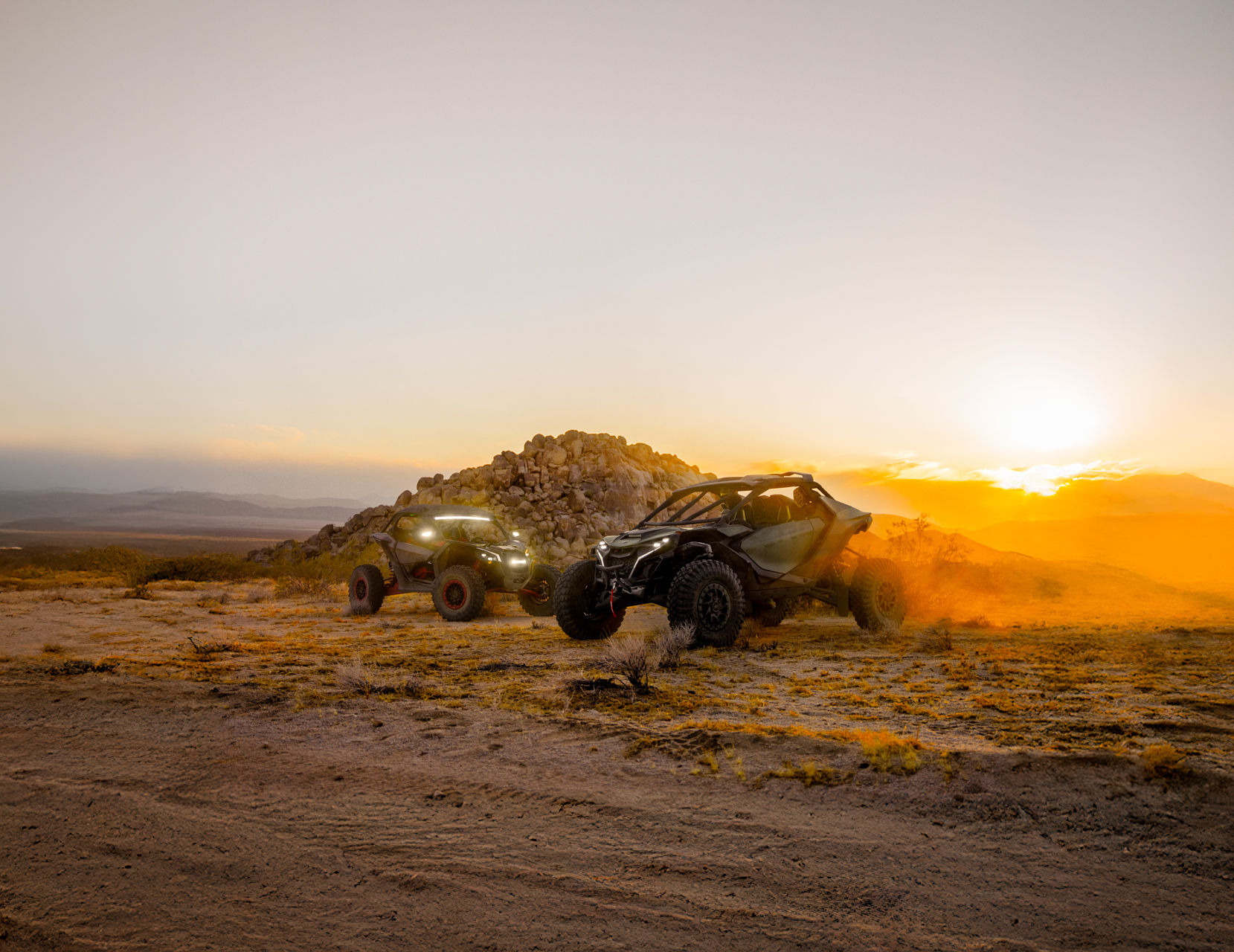 Can-Am Maverick vehicles in a desert 