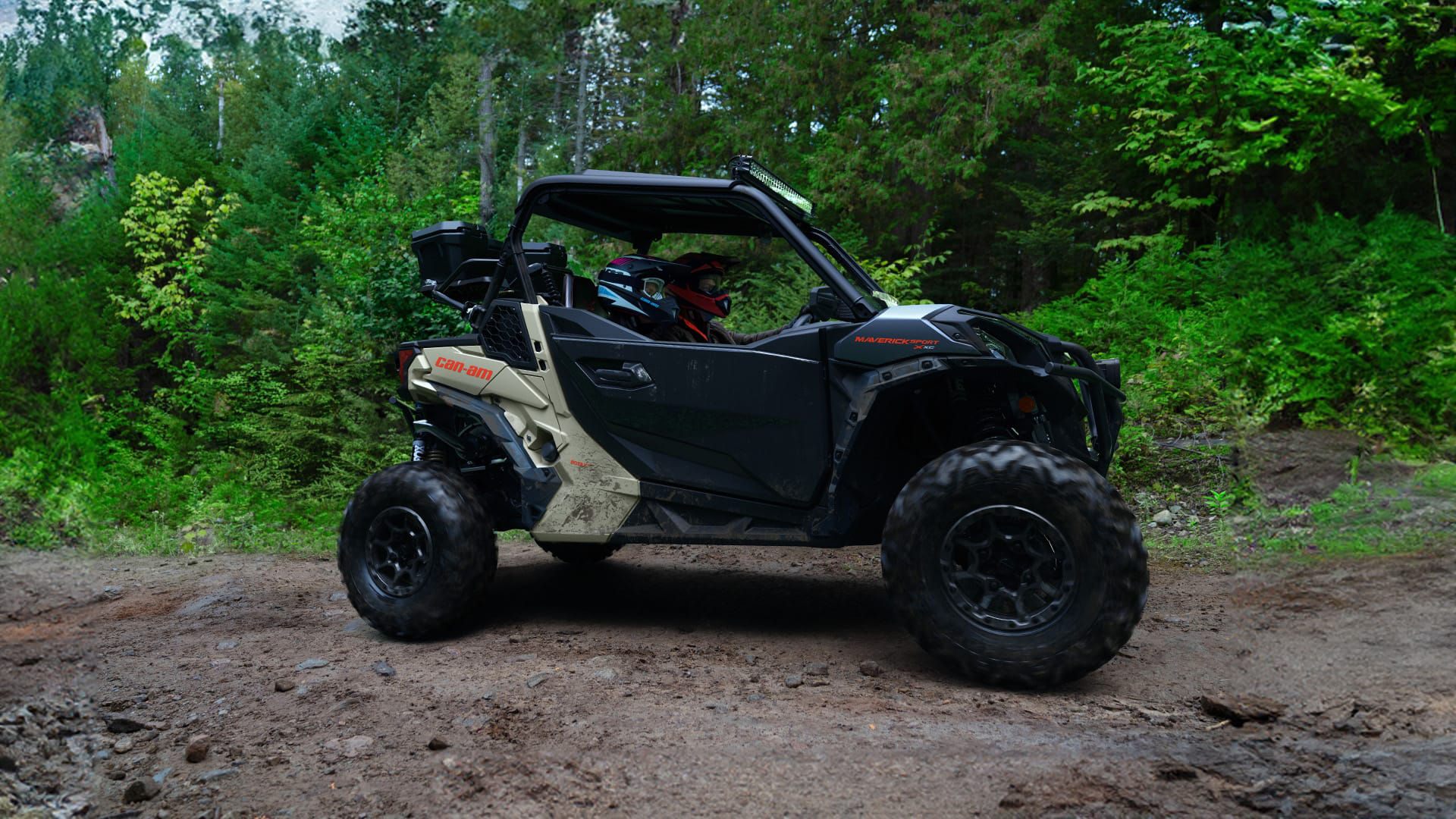 Rider exploring dirt trails in a Can-Am Maverick Sport