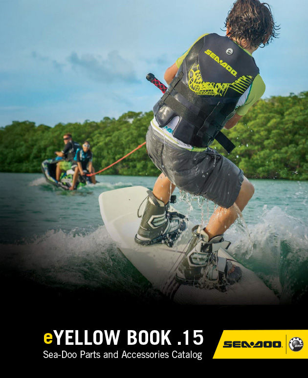 The cover of the 2015 Sea-Doo Yellowbook showing a young man being pulled by a personal watercraft