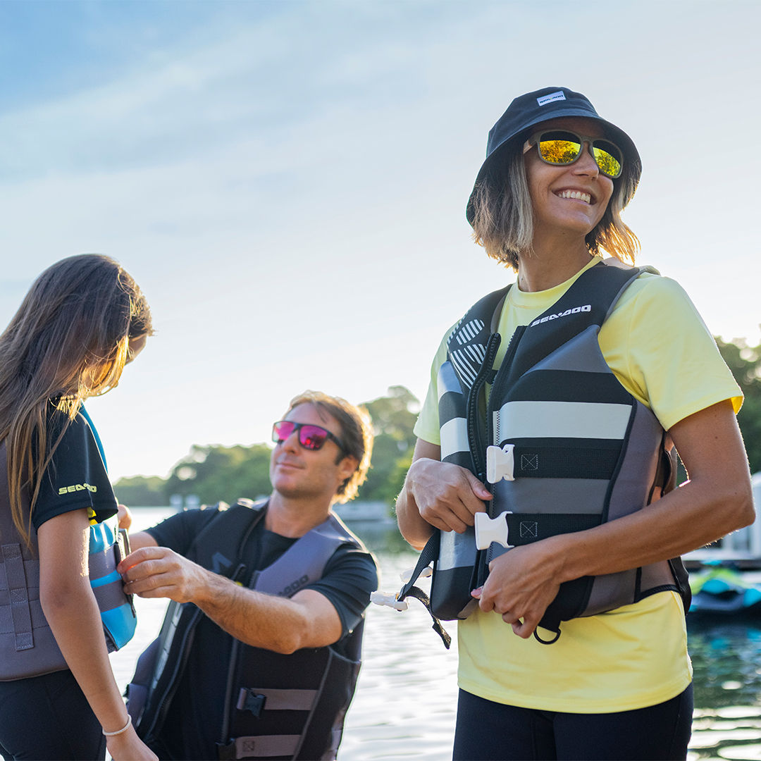 Man and woman wearing Sea-Doo protective glasses