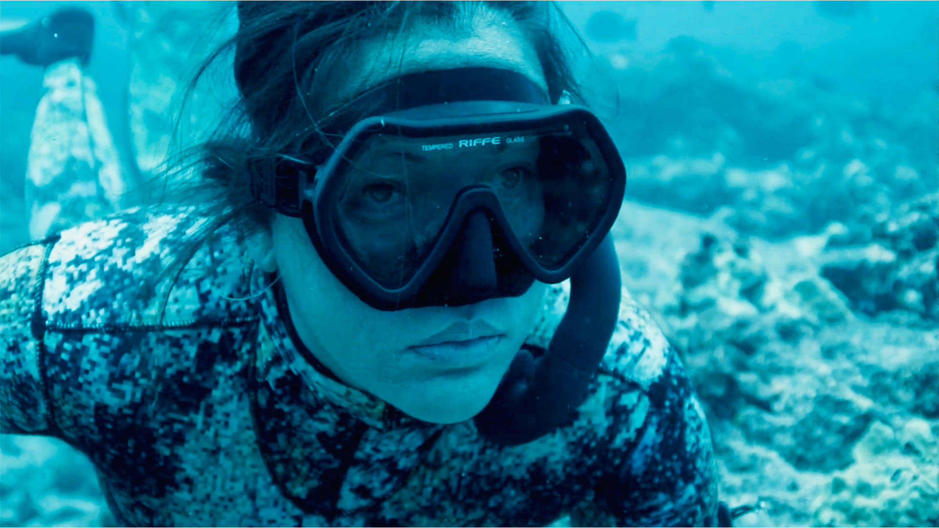 Kimi Werner diving underwater wearing Sea-Doo branded gear