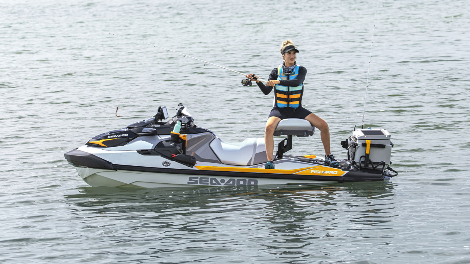 Woman fishing from a Sea-Doo FishPro Trophy