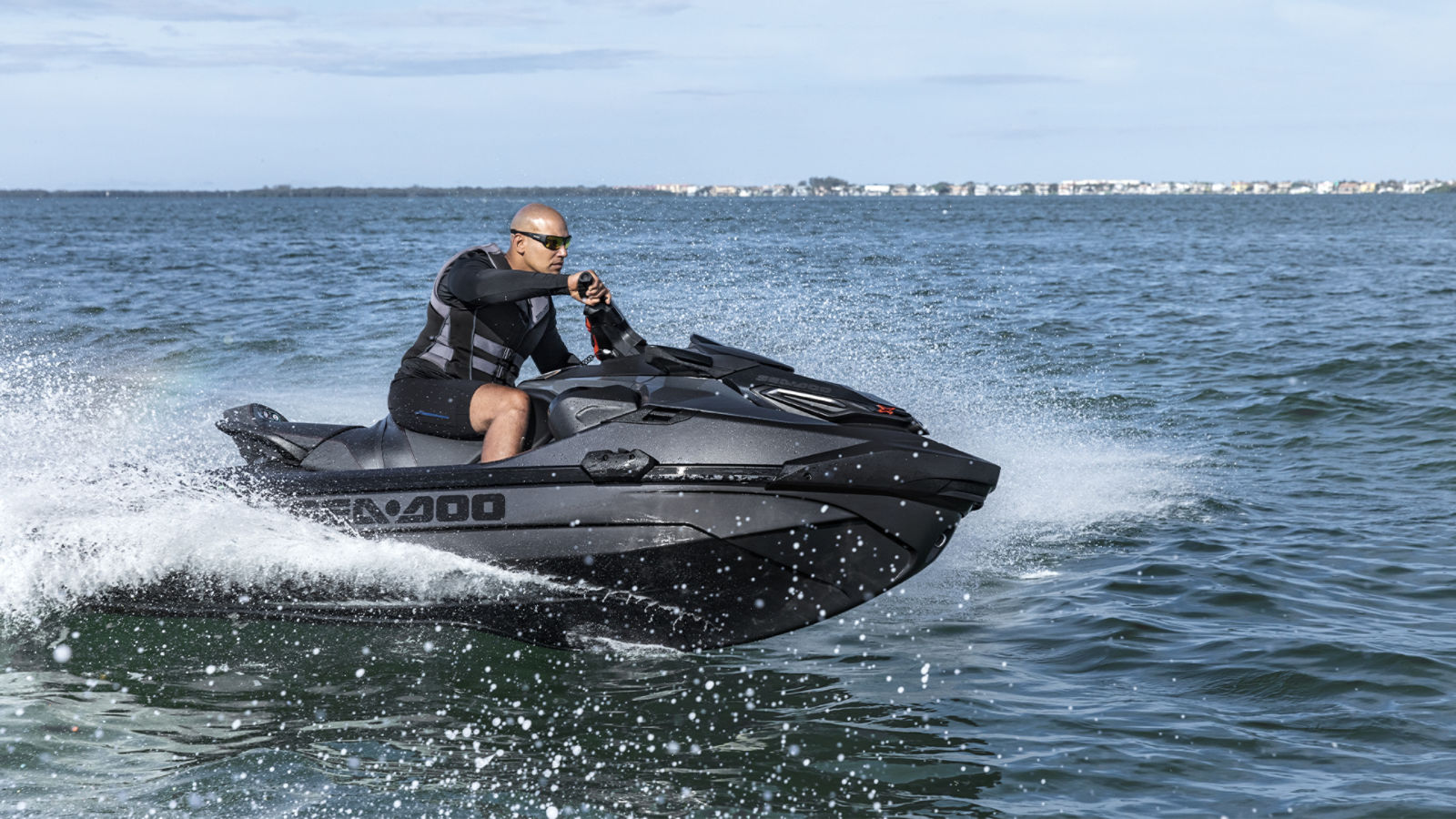 Rider driving a Sea-Doo RXT-X PWC