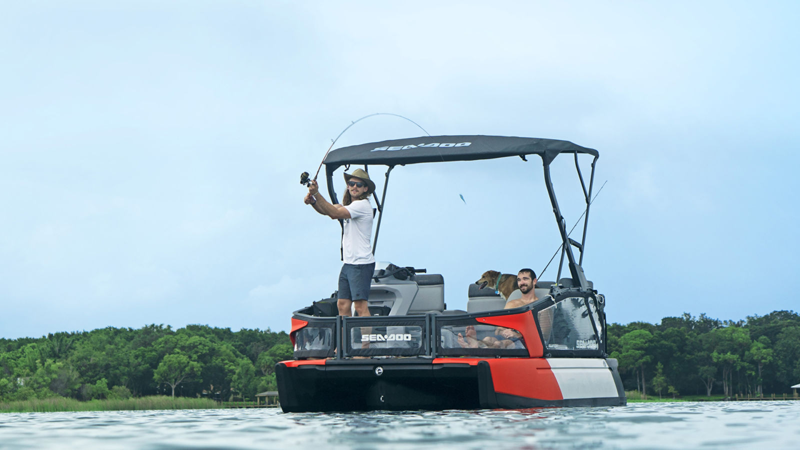 Man fishing from a Sea-Doo Switch pontoon with a friend