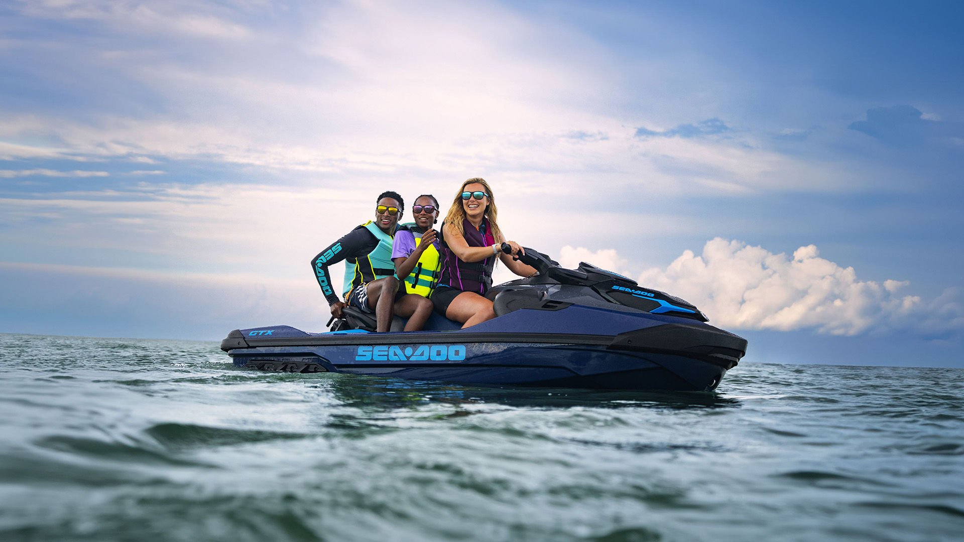 3 friends on a Sea-Doo 