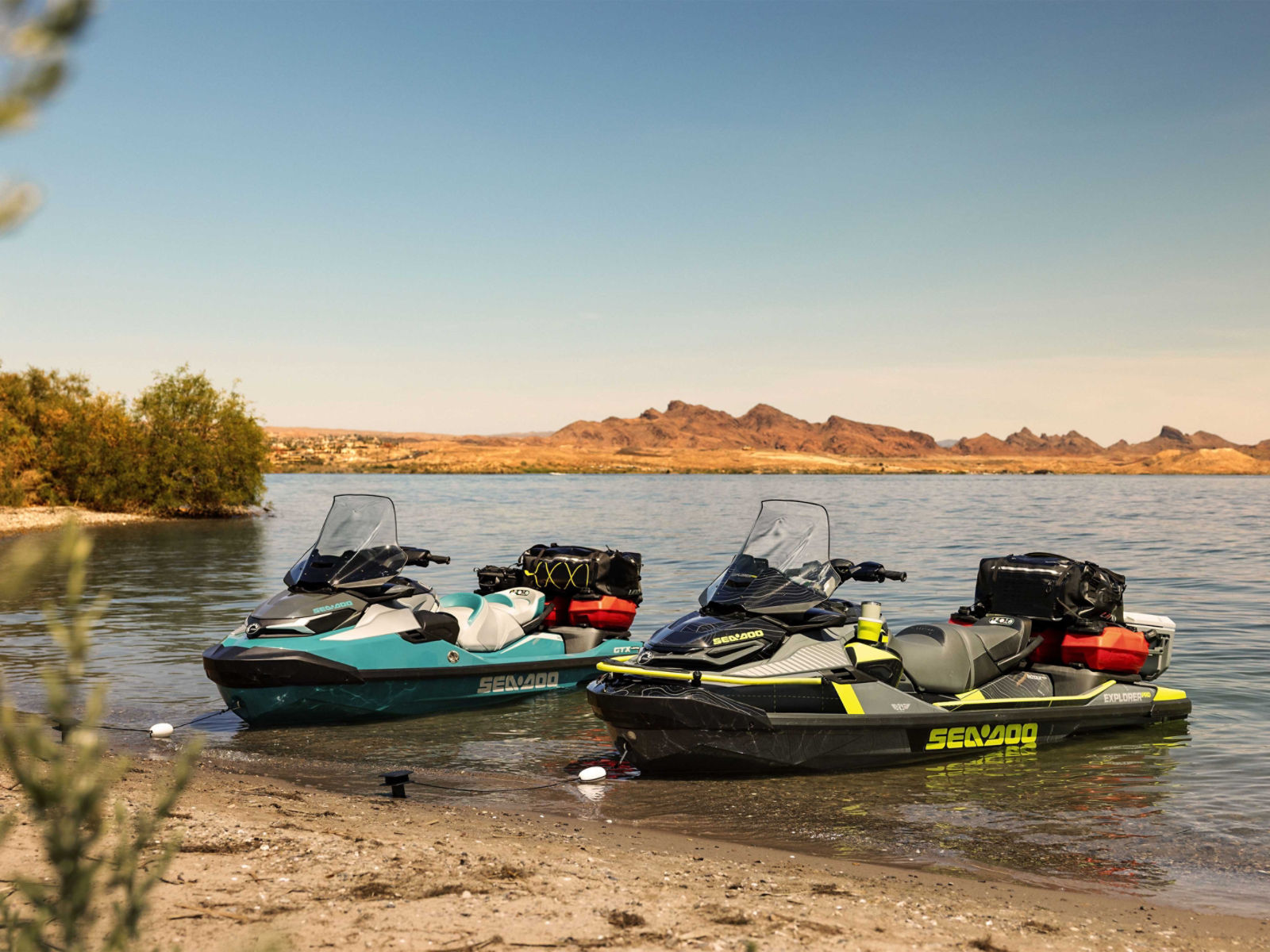 Two 2025 Sea-Doo personal watercrafts on the water