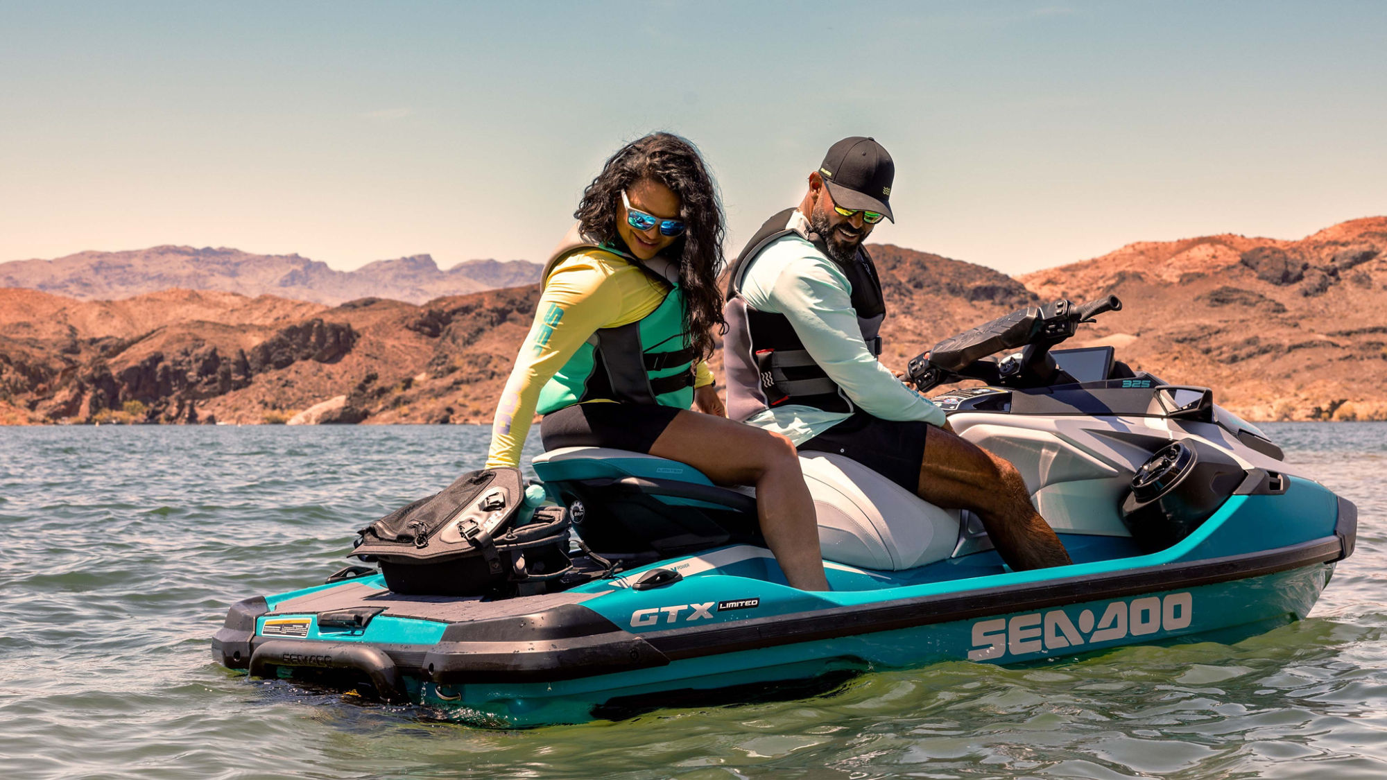 Woman using the LinQ cooler on a 2025 Sea-Doo GTX Limited