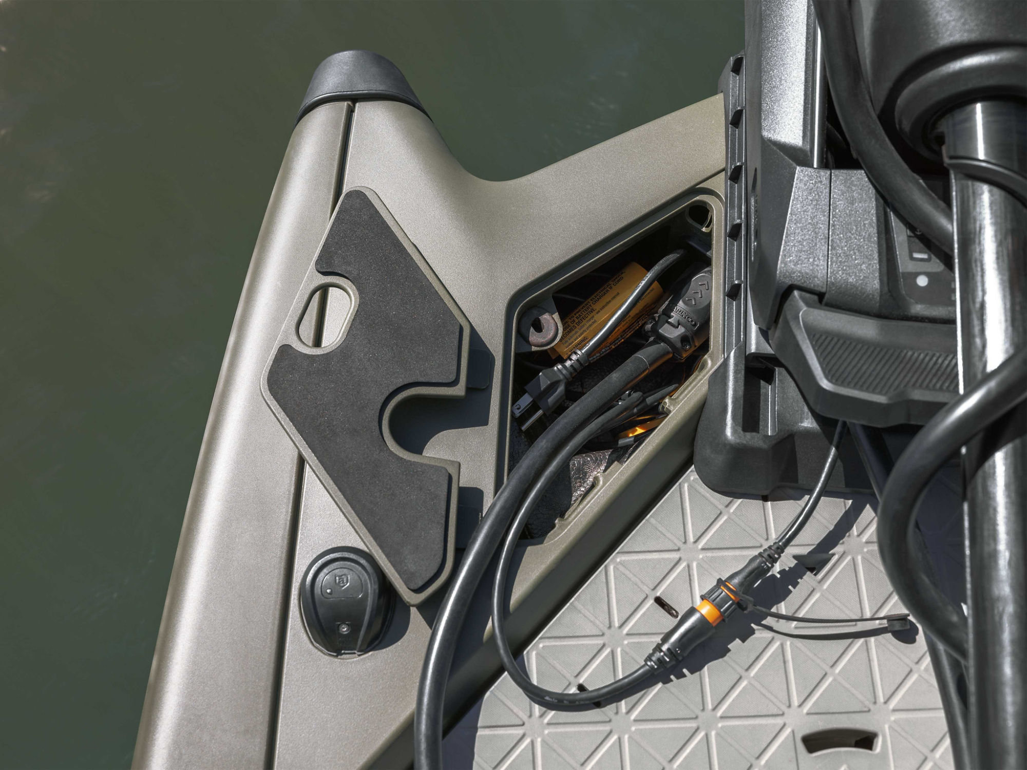 Person adding XPS oil in a Sea-Doo Switch Pontoon