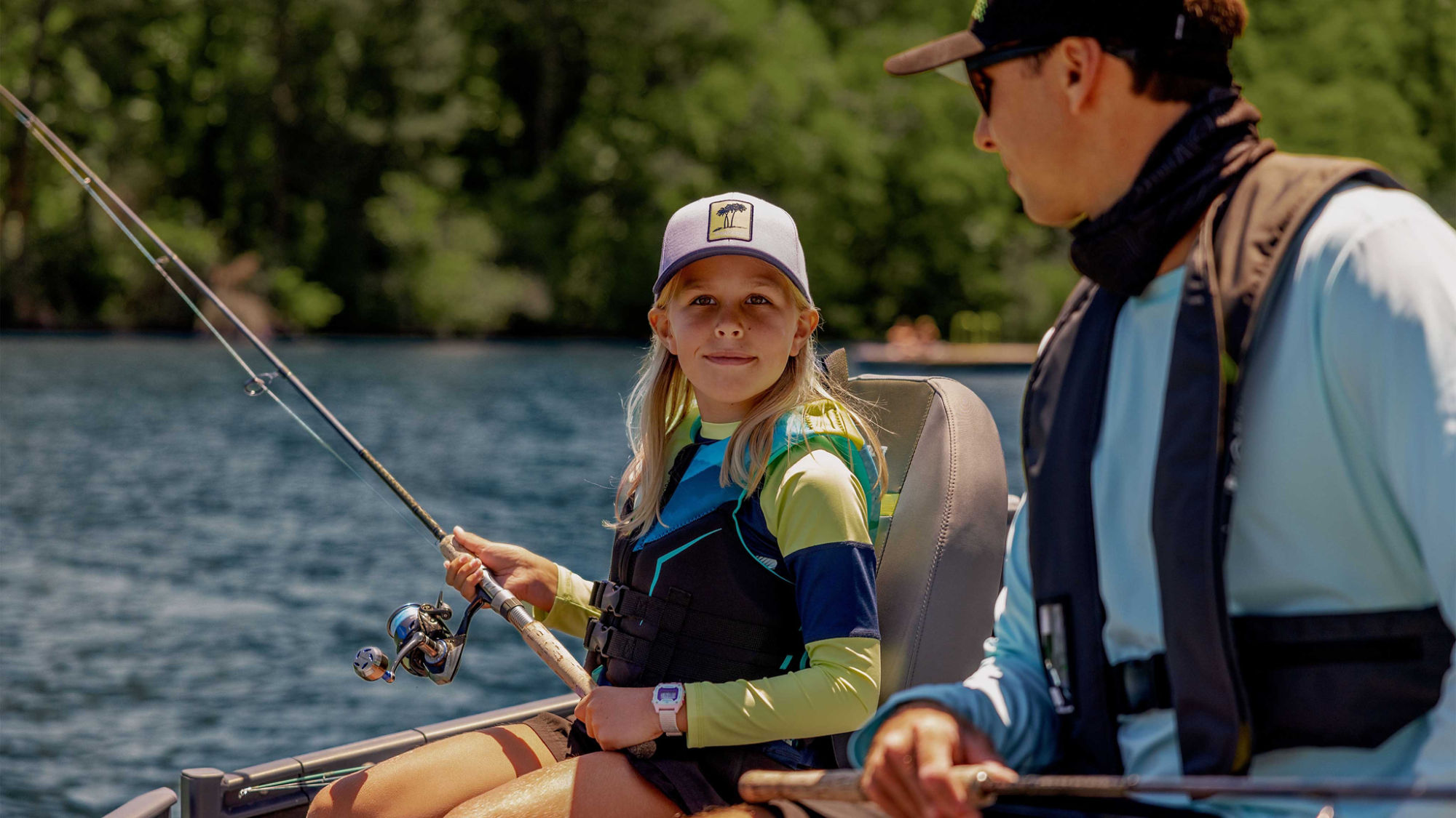 Father & Daughter fishing from a Sea-Doo Switch Fish pontoon