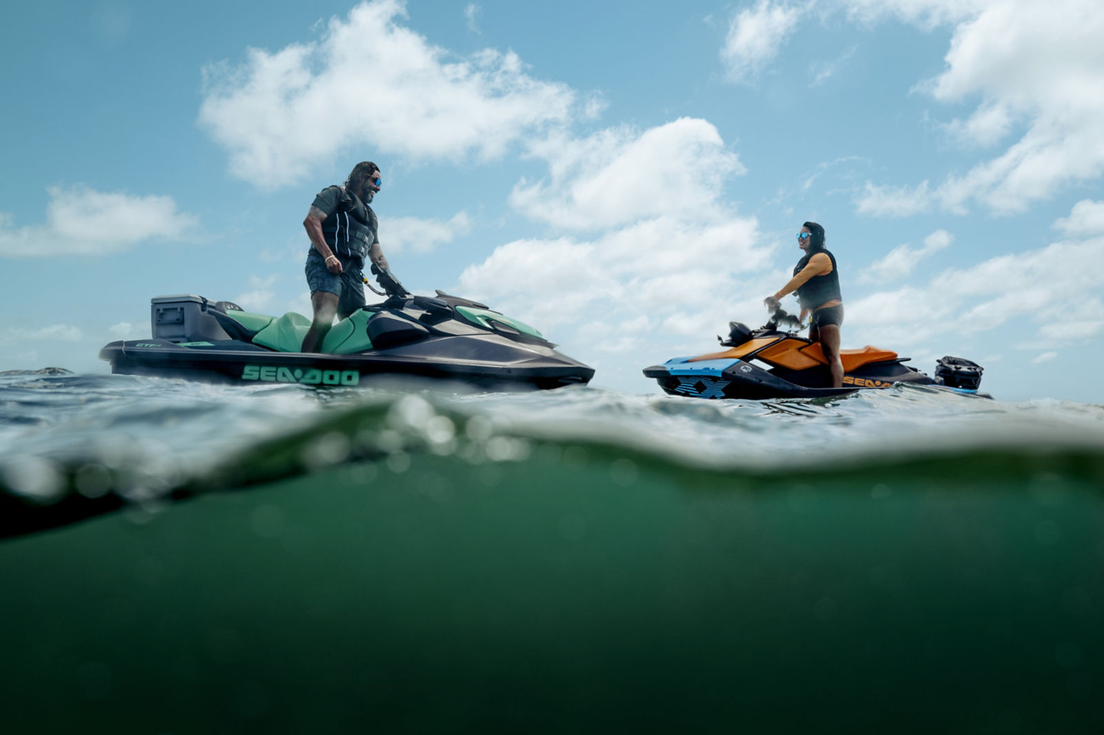 Two riders on a Sea-Doo personal watercraft