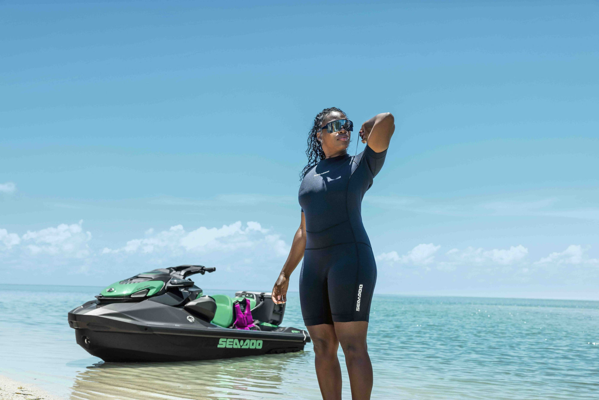 Women in the water preparing to go snorkling