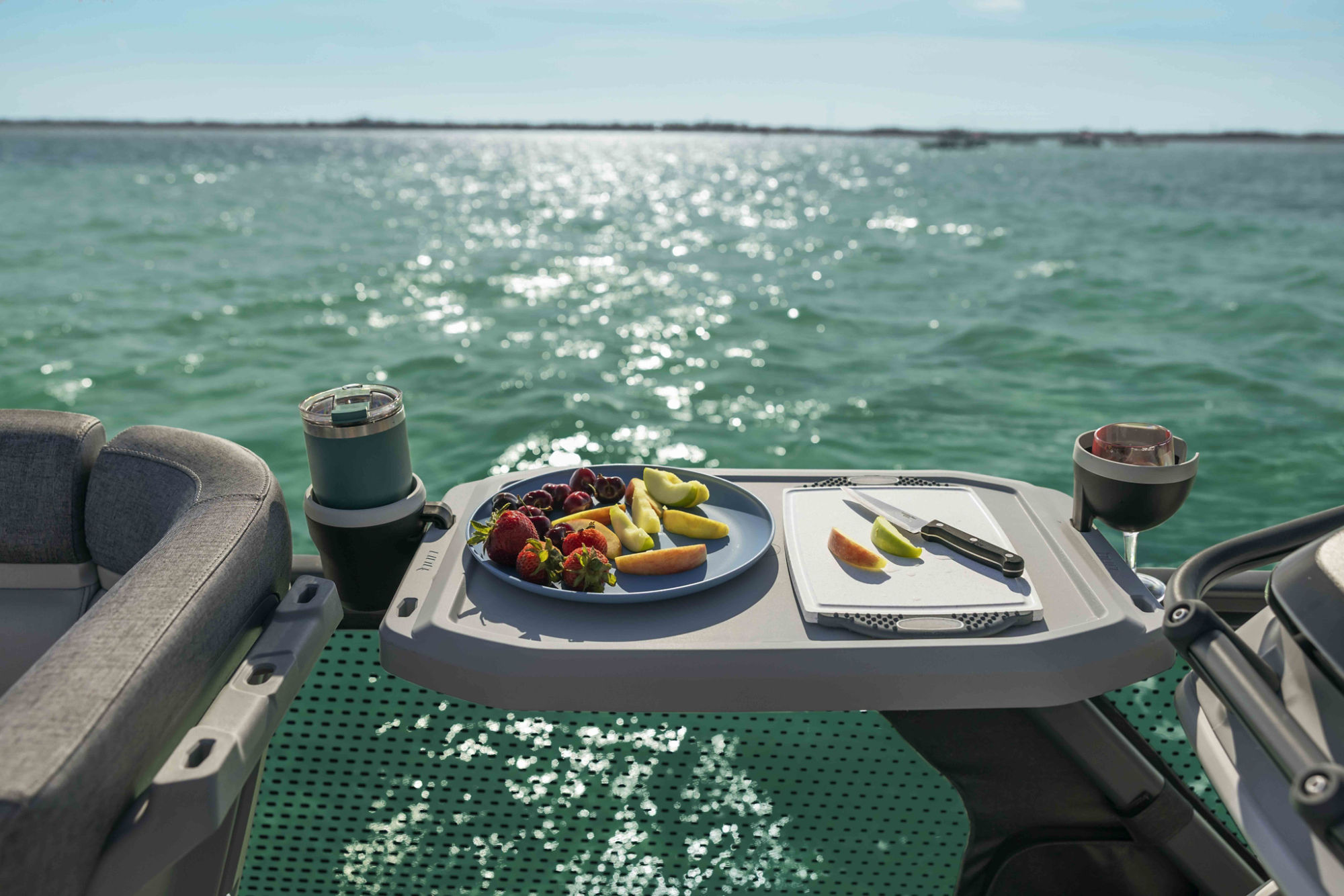 Group of friends walking on a dock near a Sea-Doo Switch