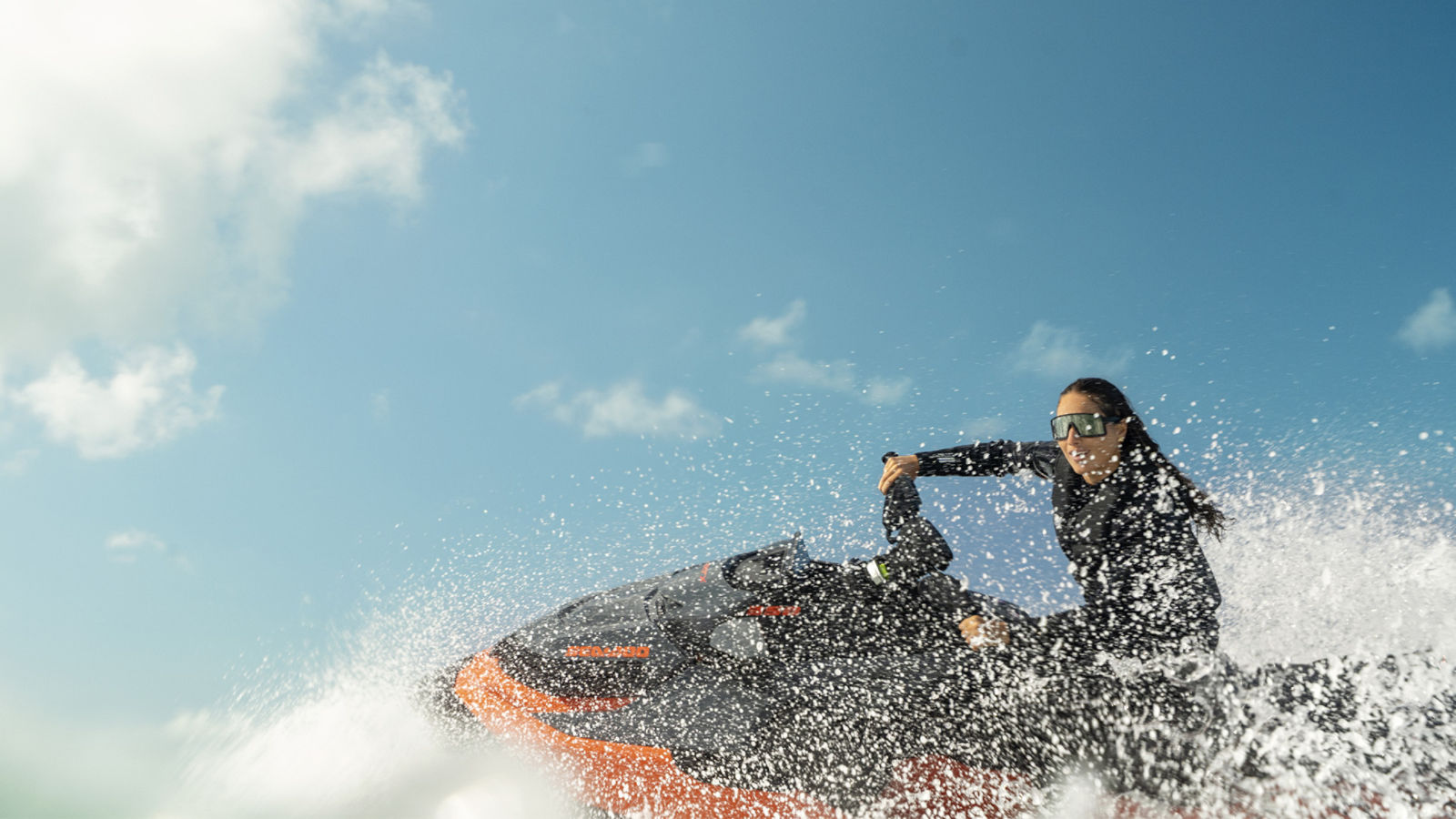 Woman turning sharply on a 2027 Sea-Doo RXT-X 350