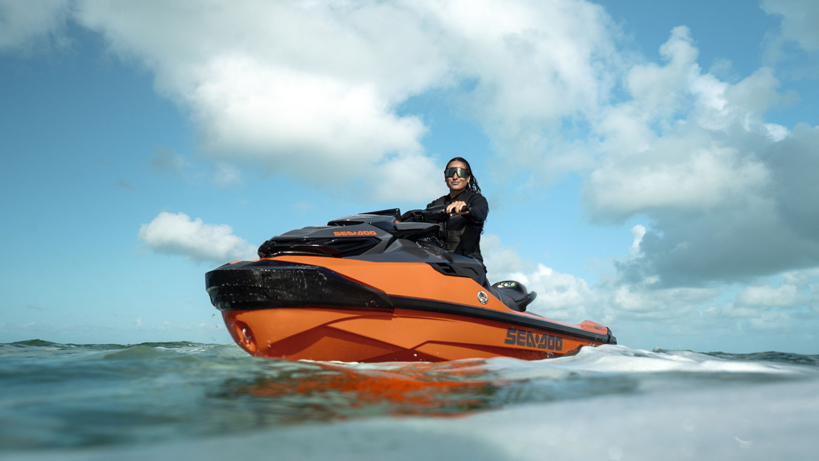 Woman riding a 2027 Sea-Doo RXT-X 350