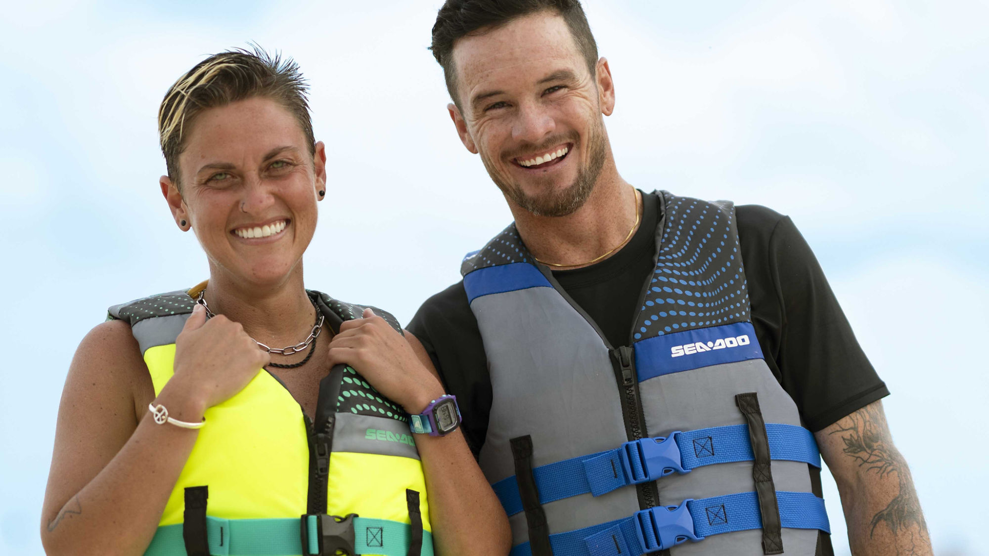 Couple wearing Sea-Doo PFDs