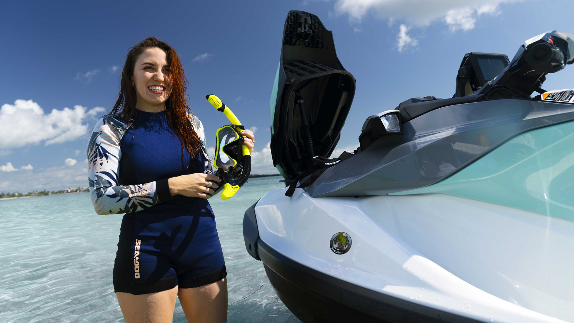 Women in the water preparing to go snorkling