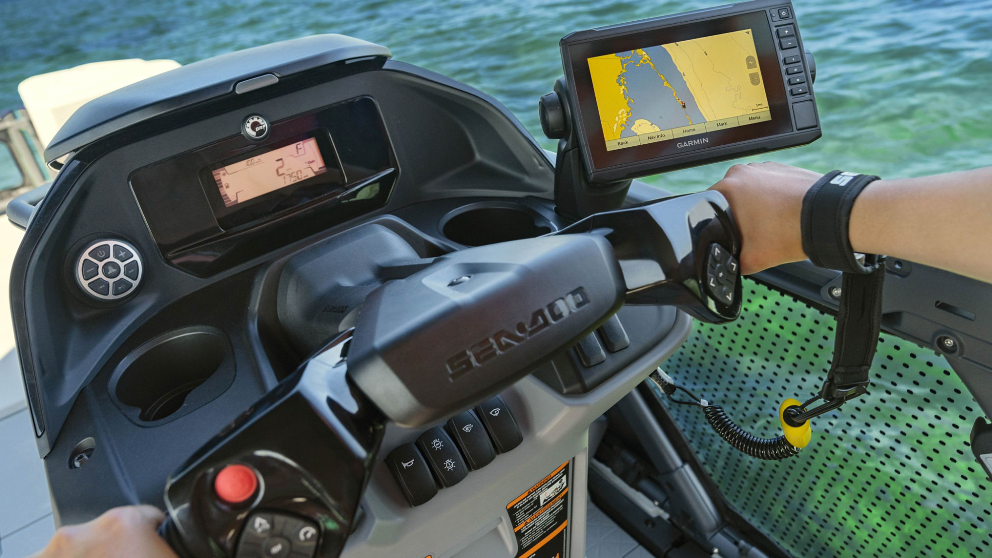 Group of friends walking on a dock near a Sea-Doo Switch