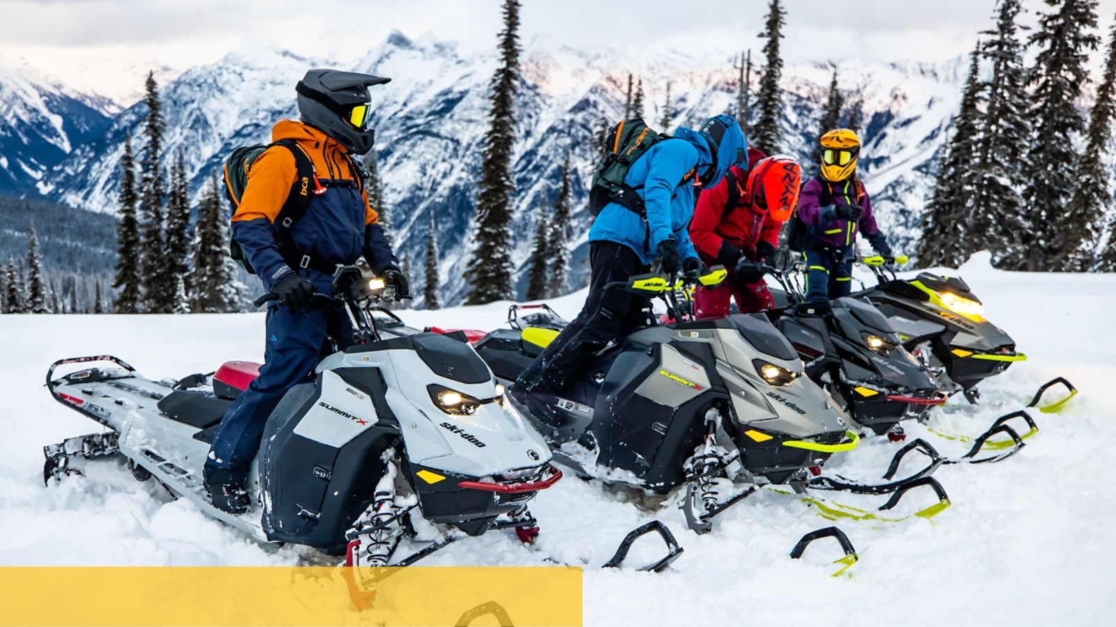 Friends talking during a ride with their Ski-Doo snowmobiles