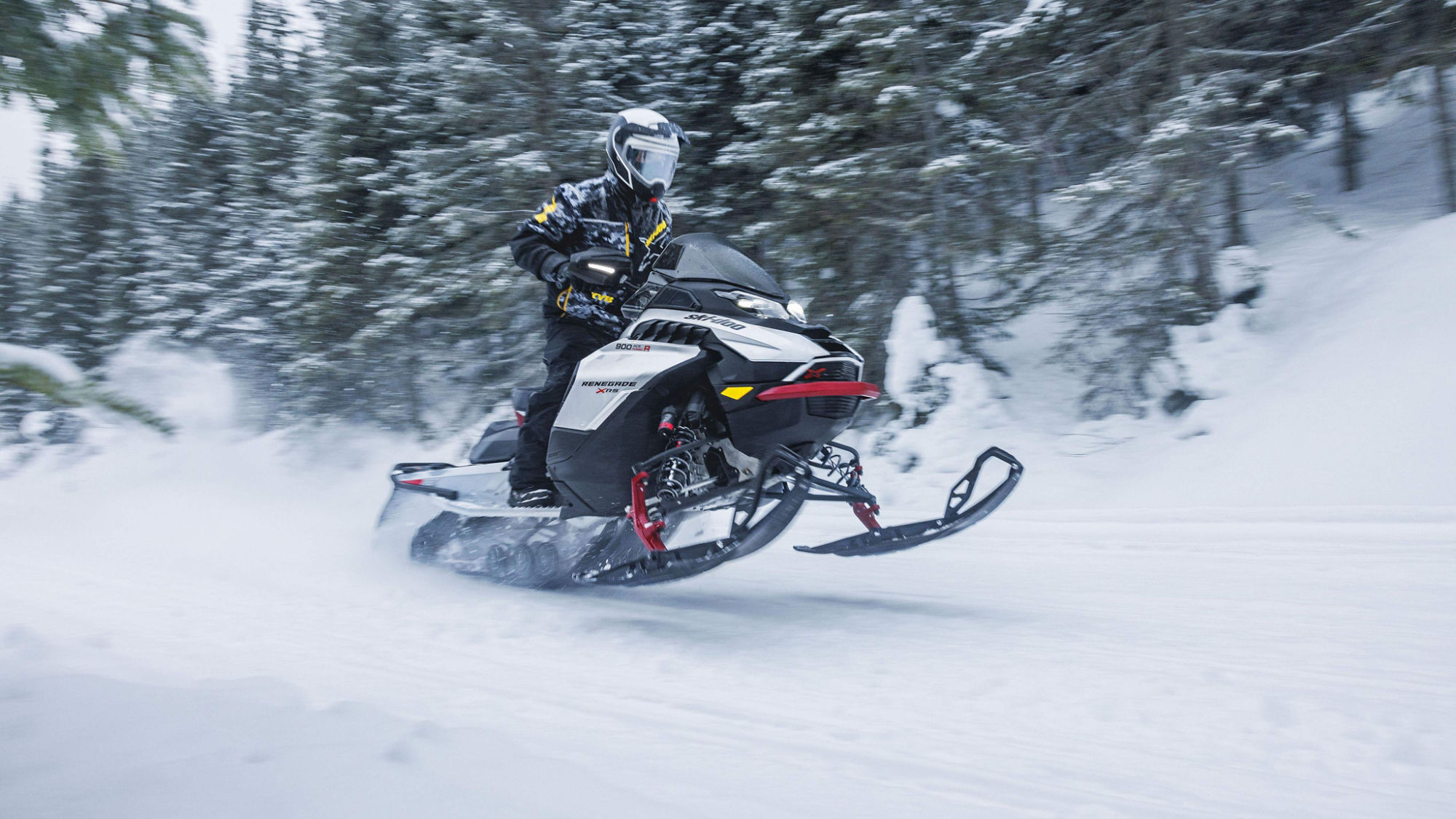 Man riding a Renegade X-RS in trail