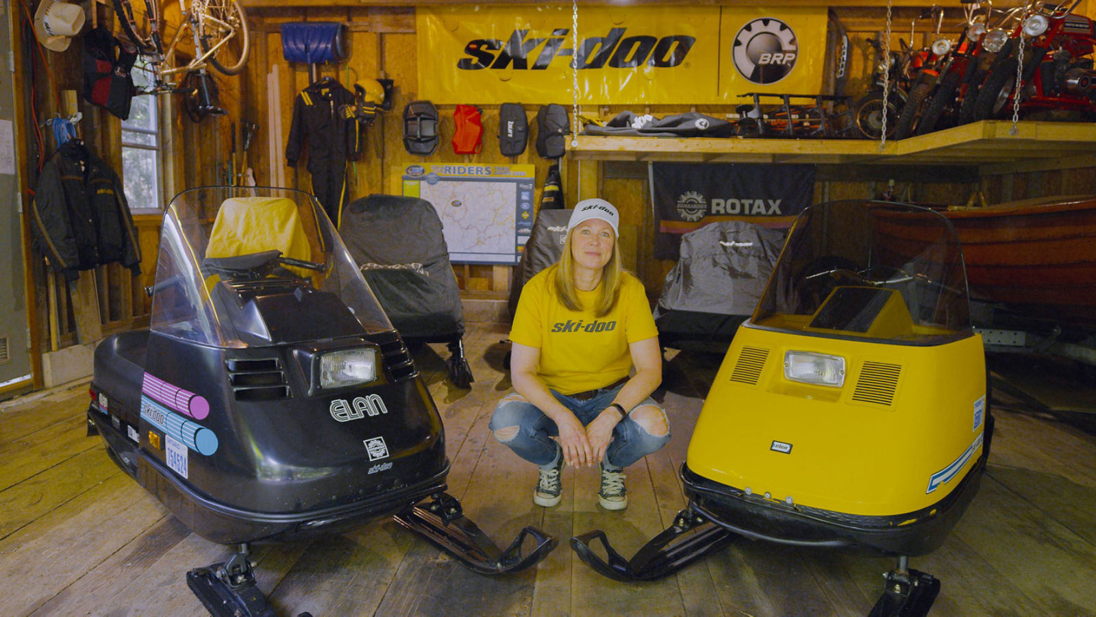 MJ Thompson next to two Ski-Doo Elan
