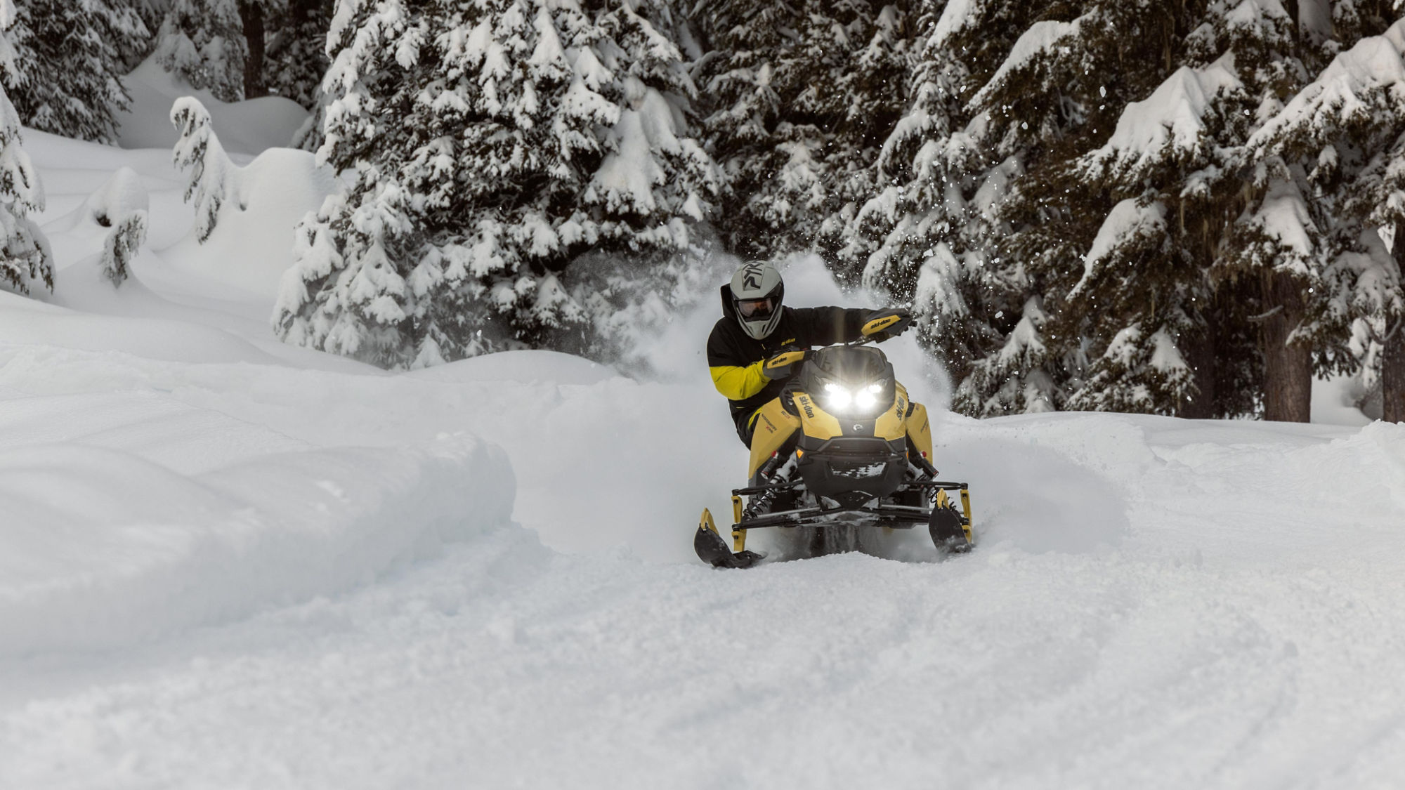2025 Ski-Doo Crossover Backcountry snowmobile riding in deep snow