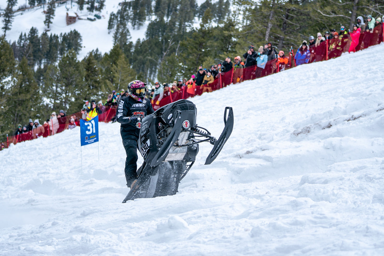 Rider in the hillclimb race event on his 2026 Ski-Doo snowmobile