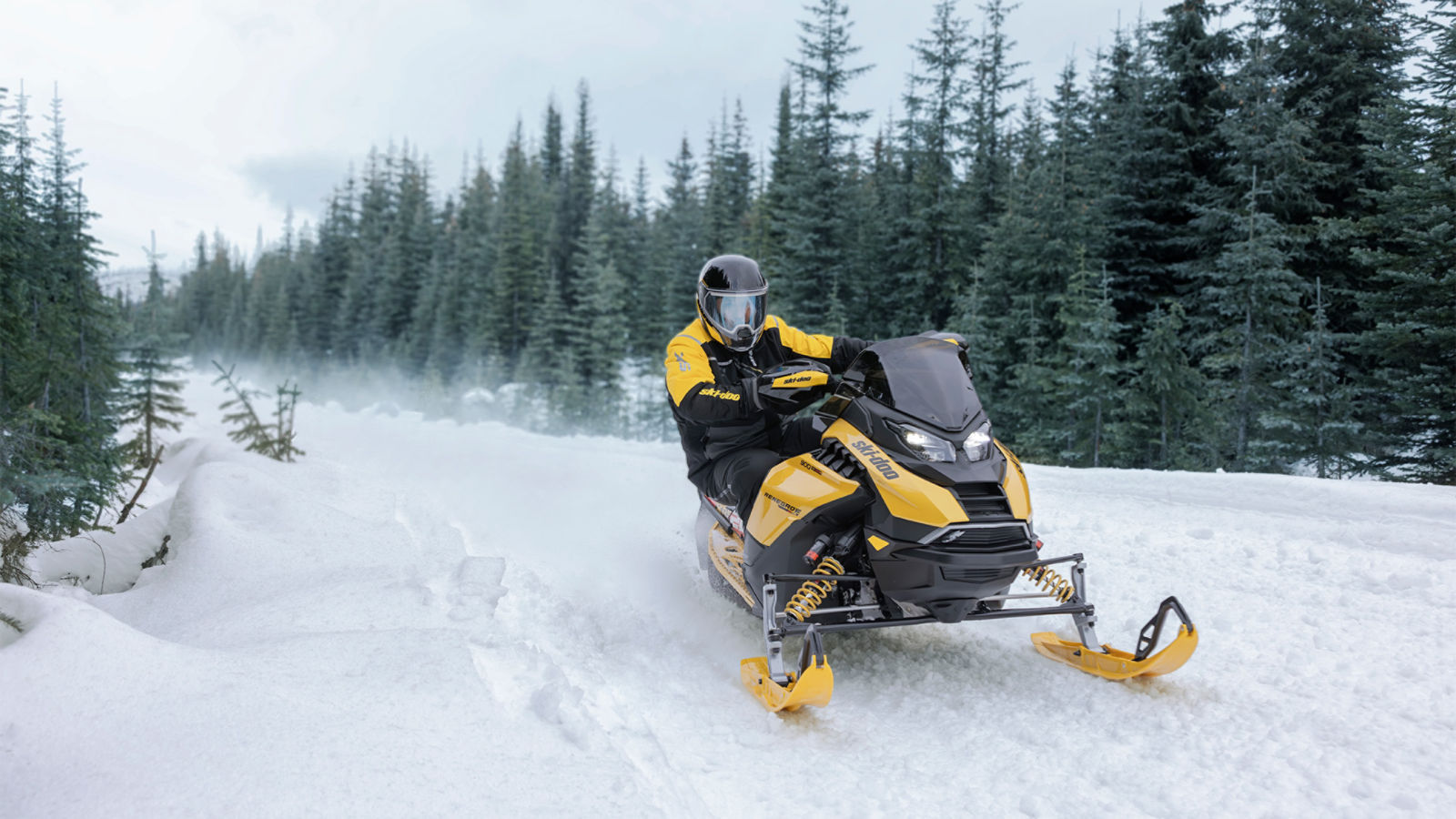 Rider riding a 2027 Ski-Doo Renegade X-RS on a snowy trail