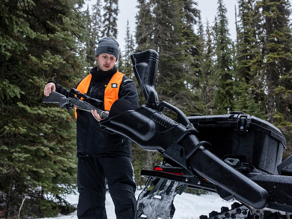 Rider using a Kolpin Gunboot on his 2027 Ski-Doo Tundra LE snowmobile