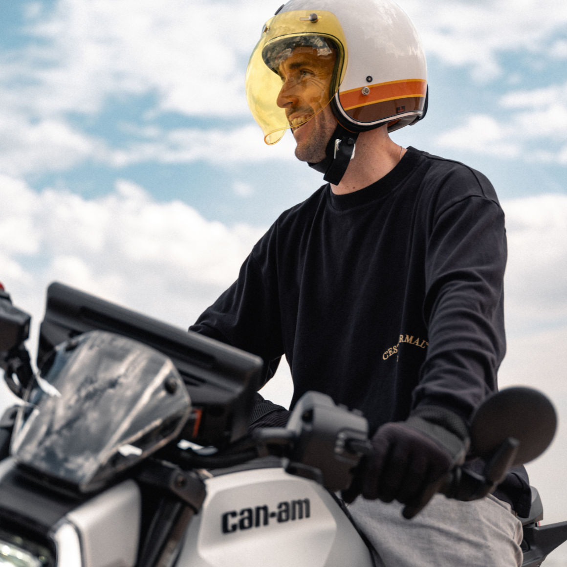 Man sitting on a Can-Am electric moto