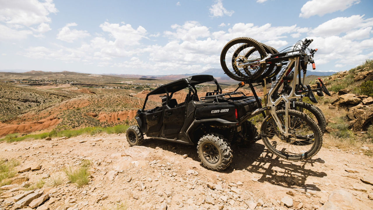 Can-Am driving on a gravel road