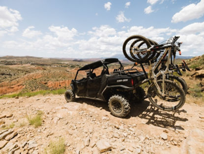 Can-Am driving on a gravel road